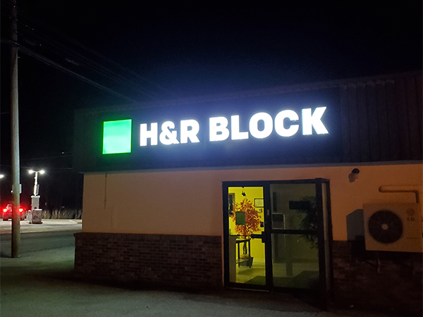 Illuminated channel letter sign installation